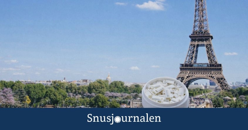 En dosa nikotinpåse bredvid eiffeltornet i Paris - vitt snus förbjuds i Frankrike 1 april 2026