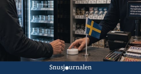 Tourist buying snus in a Swedish convenience store - Snus in Stockholm